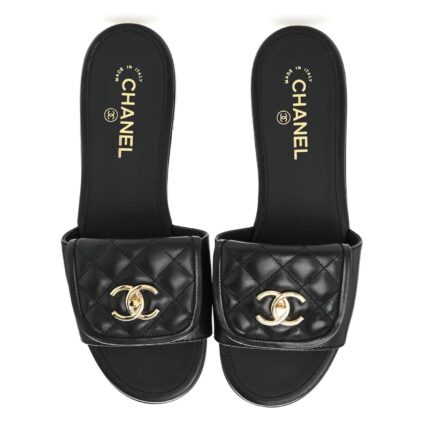 MULES PLATES MATELASSEES A BRIDE TOURNANTE EN NOIR
